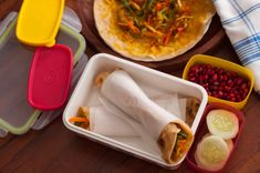 https://images.archanaskitchen.com/images/recipe-collection/office-kids-lunch-box-ideas-recipes/everyday_meal_plate_with_vegetable_frankie_roll_2_9f678001b1.jpg