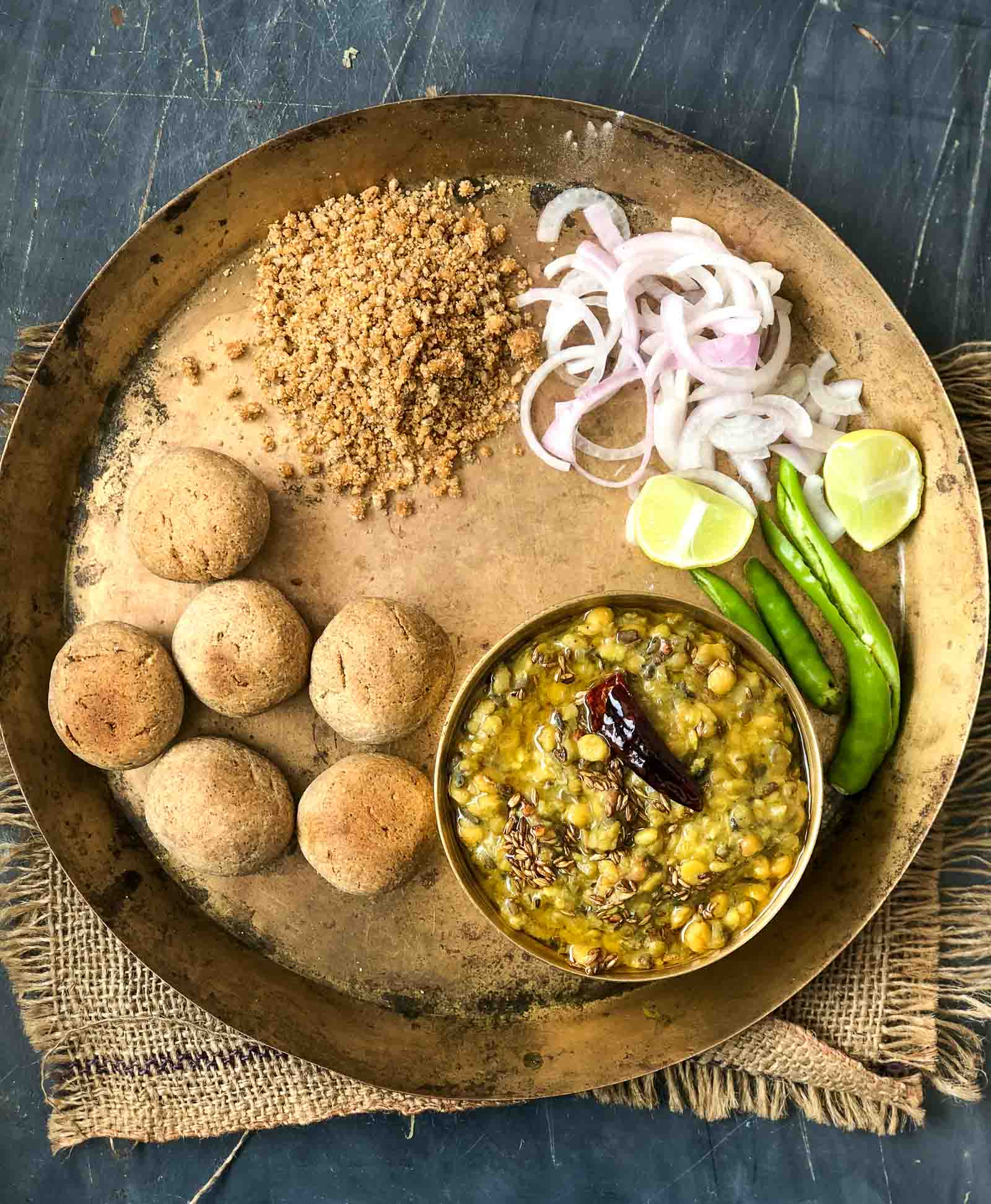 https://images.archanaskitchen.com/images/recipes/indian/main-course/north-indian-vegetarian-recipes/dal-recipes/Rajasthani_Dal_Bati_Churma_Recipe_5_b70738b4bd.jpg